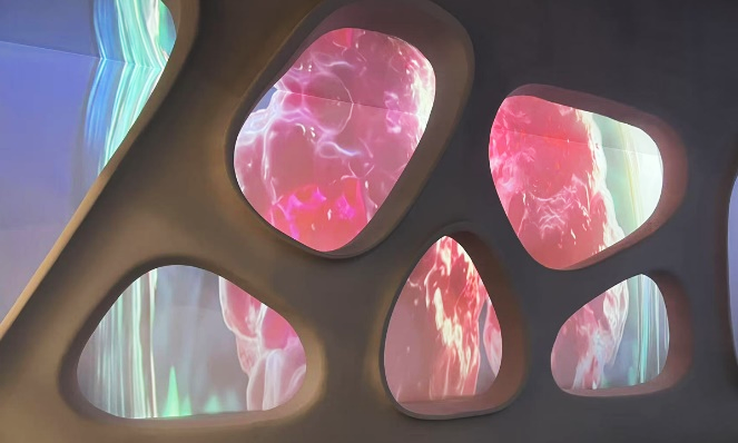 A close-up of a wall with oval shaped windowsAI-generated content may be incorrect.