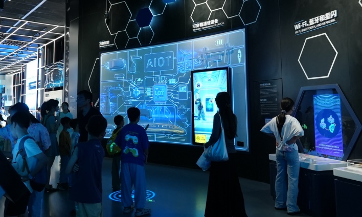 A group of people looking at a large screenAI-generated content may be incorrect.
